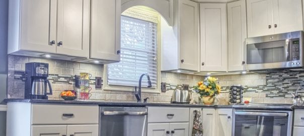 Tan kitchen cabinets and modern kitchen design