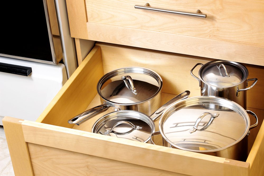 drawer full of pots and pans