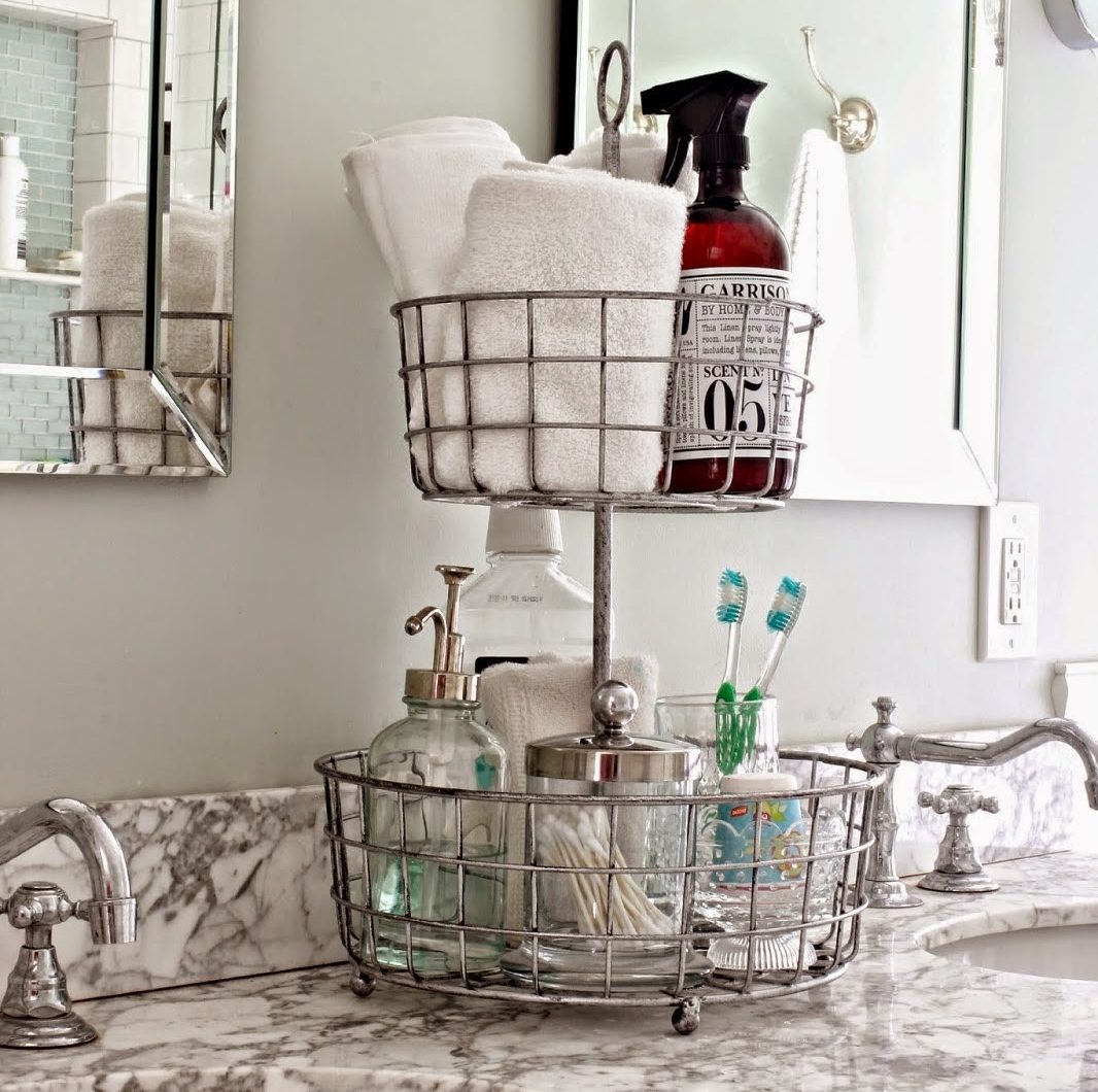 tiered baskets on bathroom counter