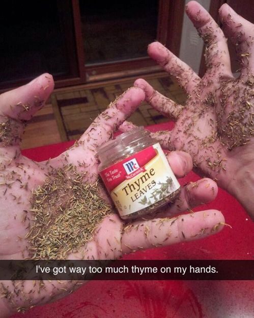 thyme leaves on hands