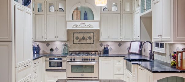 Beautiful white kitchen cabinets are neatly organized