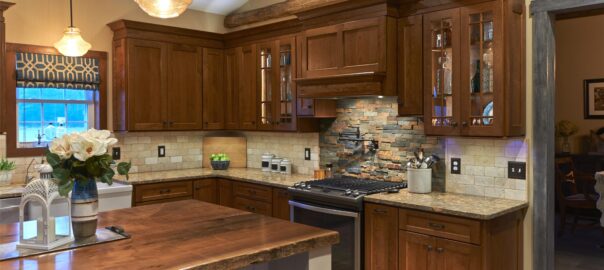 An image of a kitchen with wooden cabinetry.
